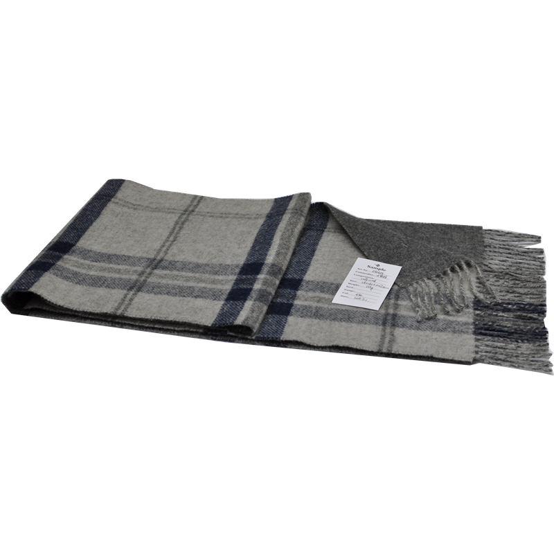 A neatly stacked grey and navy plaid scarf, made from 100% pure wool for a soft and cozy feel.