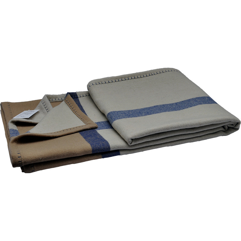 Layered Q0192-A heavyweight lambswool blanket with warm-grey panels, blue woven stripes and camel border details.