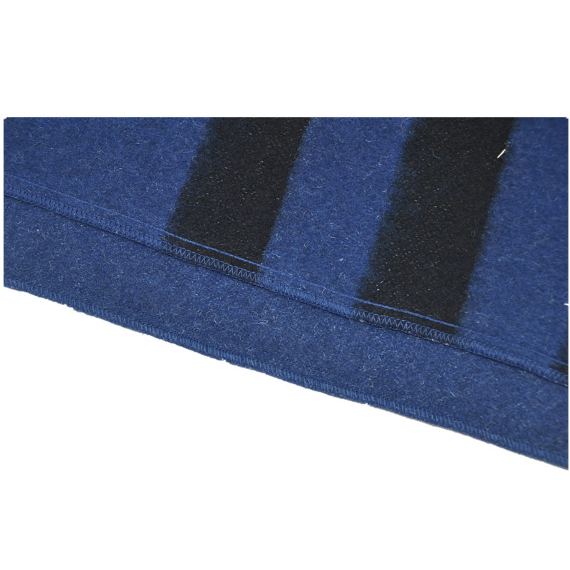 tbh2001 blue wool blend blanket, close-up of dark stripes, brushed texture and blue overlock stitching