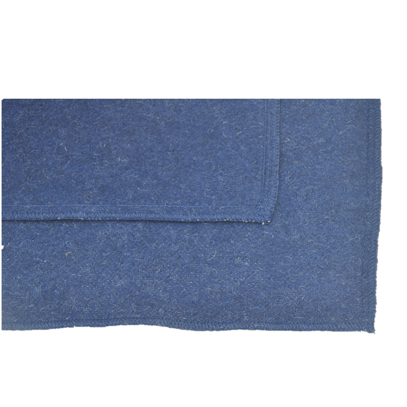 tbh2001 blue wool blend blanket, corner detail, plain brushed surface and matching blue overlock edges