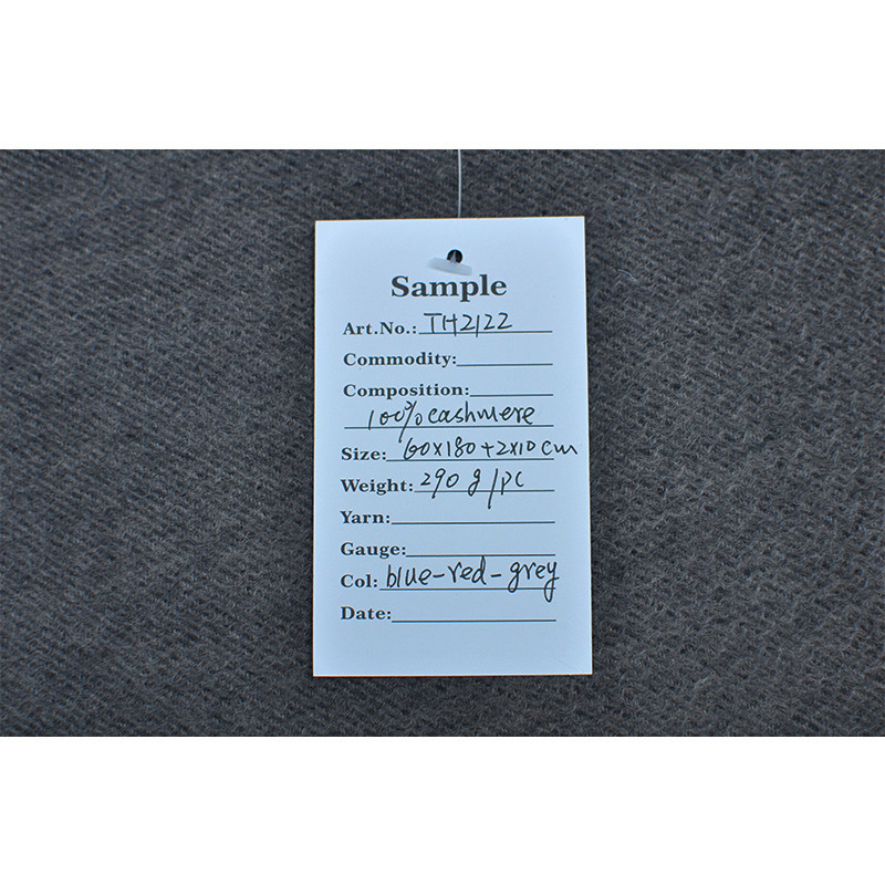 TH2122 cashmere shawl sample label showing 100% cashmere material specification
