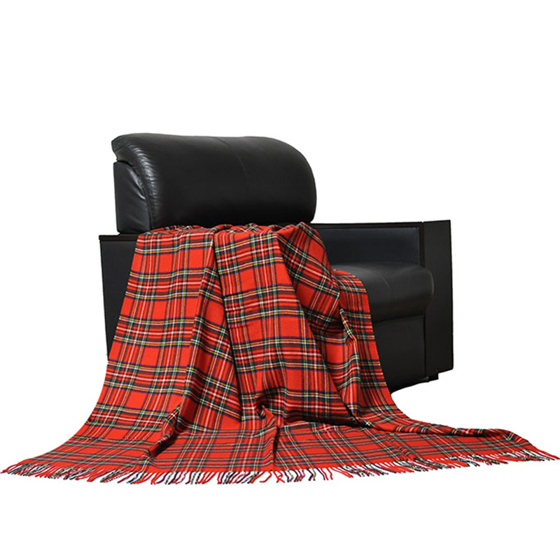 TDC2103 red tartan blanket styled elegantly as a decorative couch throw in a modern living room setup