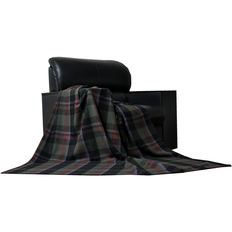 TBT1802 green tartan wool blanket draped over a black armchair for premium living-room and office use