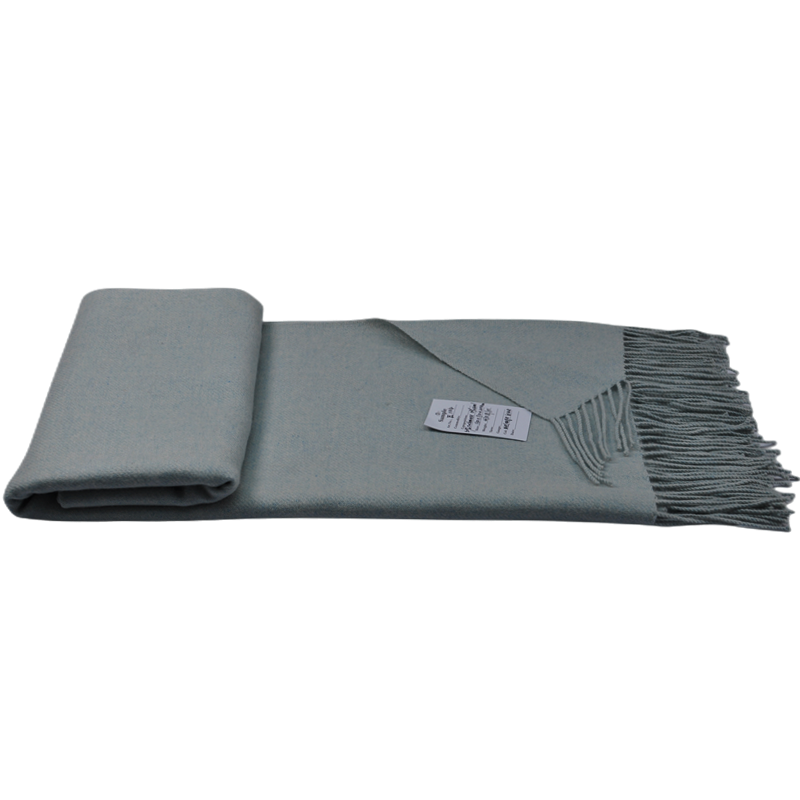 Close-up of neatly folded E1104 luxury cashmere wool throw