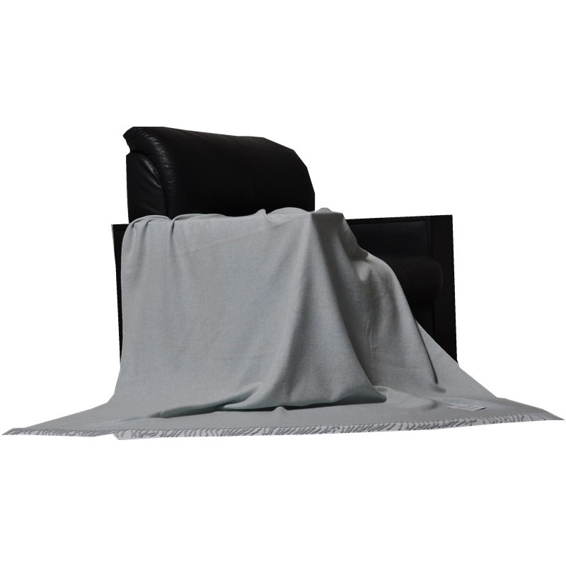 uxury mélange blue cashmere wool throw E1104 draped on a chair, side angle
