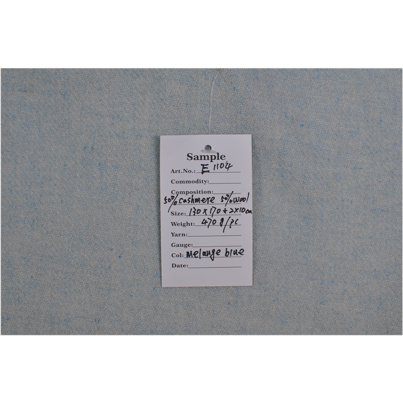 Folded E1104 mélange blue cashmere wool blend throw with tag