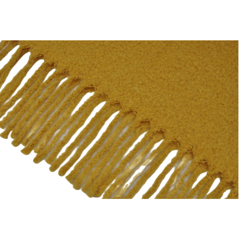 Gold-textured-throw-blanket-TDC2203-draped-over-black-leather-chair-for-home-decor