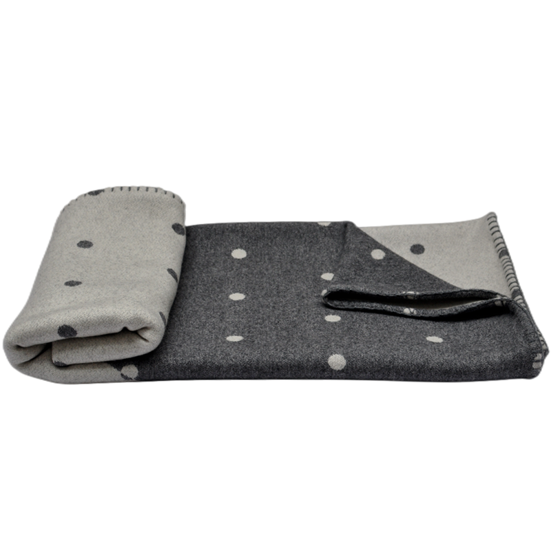 Double sided wool throw folded display