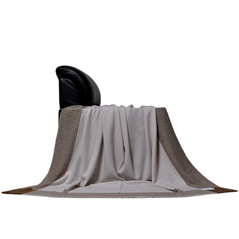 soft two tone houndstooth wool blanket draped on leather chair natural fluffy drape texture TAK2216