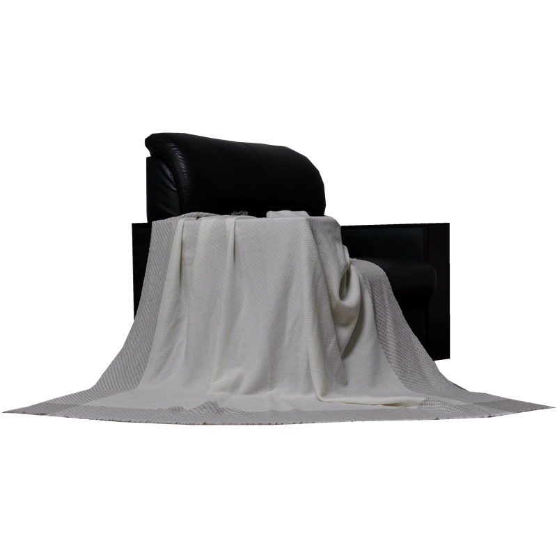 luxury cashmere blend blanket displayed on chair with soft wool cashmere texture and elegant home style