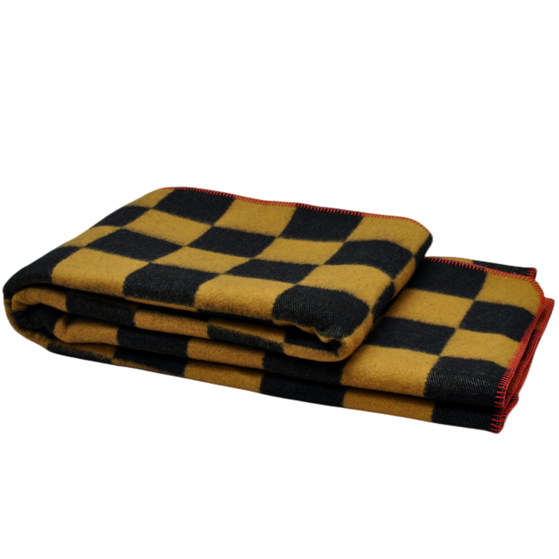 Folded TBT1804 100% Australian wool blanket with mustard-yellow and black checkerboard jacquard and red overlock edges