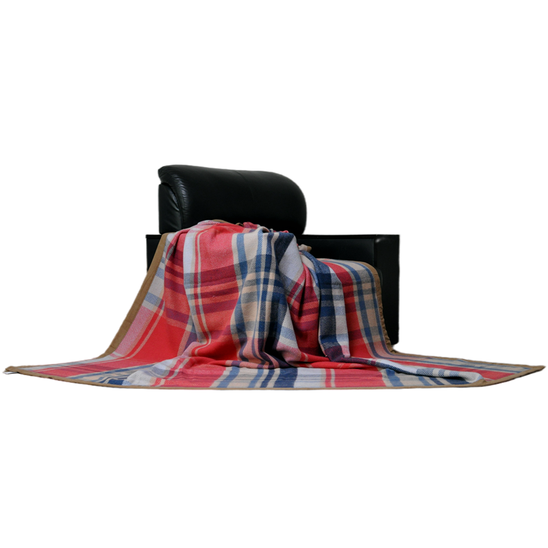 Blue Phoenix Q1070 red blue plaid wool throw blanket draped over black leather sofa