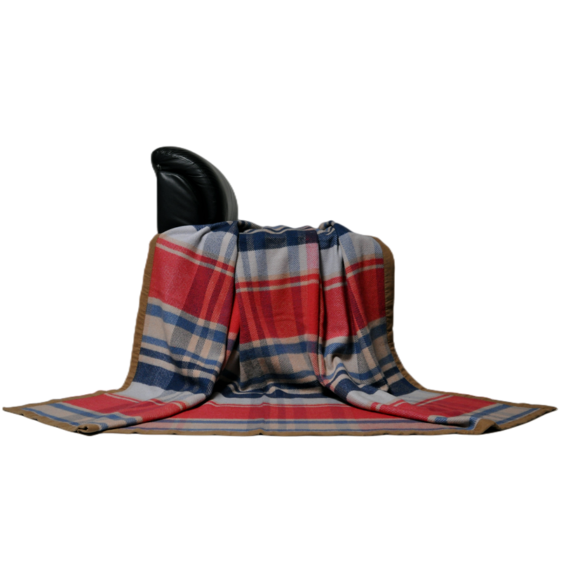 Close-up view of Blue Phoenix Q1070 plaid blanket texture and woven edge