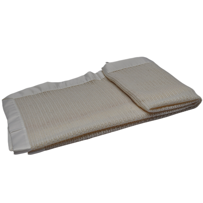 Natural wool throw blanket styled on a modern chair for premium home interior decoration