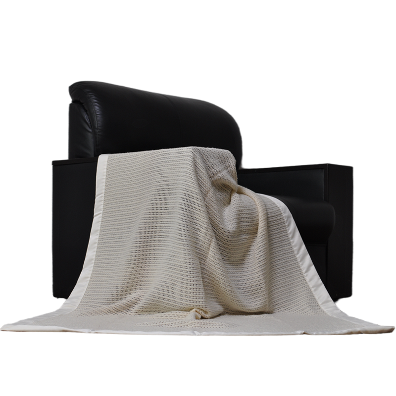 100% wool blanket hanging display showing elegant drape and breathable woven texture