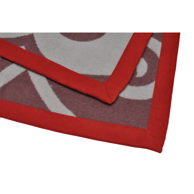 close-up-of-pure-wool-fiber-weave-and-red-stitched-edge