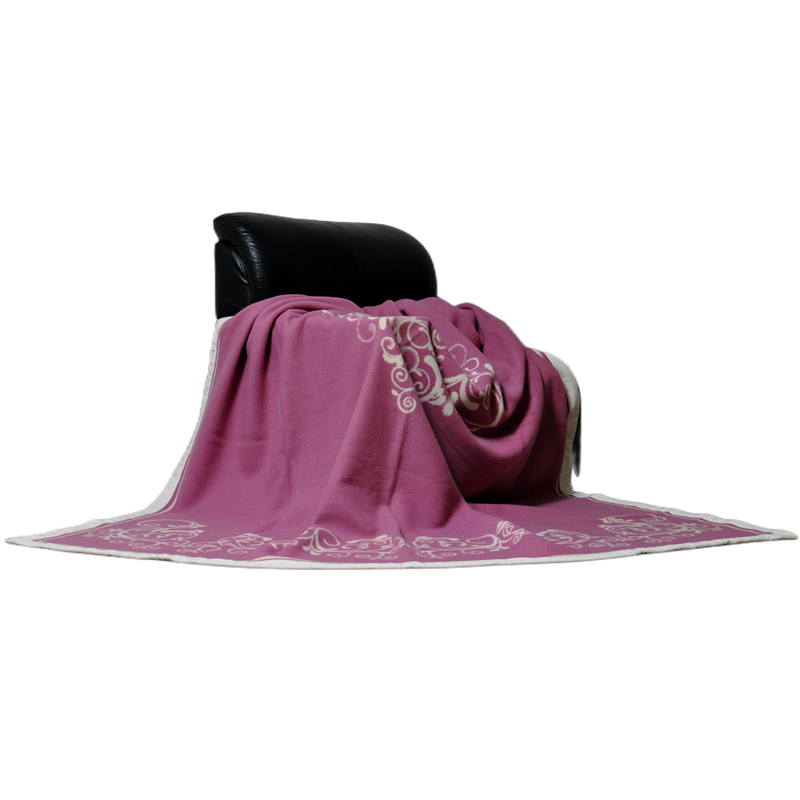 Folded LL1101 luxury 100% Merino wool Damask Scroll jacquard blanket with pink and white pattern.