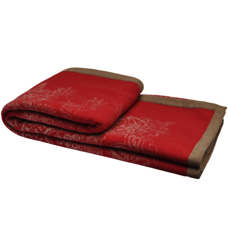 Red paisley jacquard wool blanket brown trim folded view