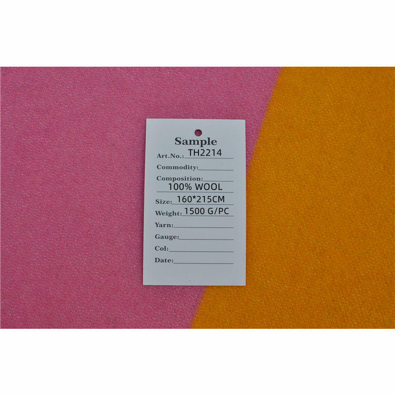 TH2214 sample hang tag label on tri-color block 100% wool blanket fabric showing size weight composition parameter detail