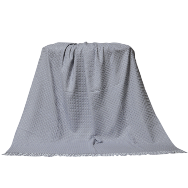 Detail of the lightweight 190gsm TDL1604-A blanket for travel and home decor.