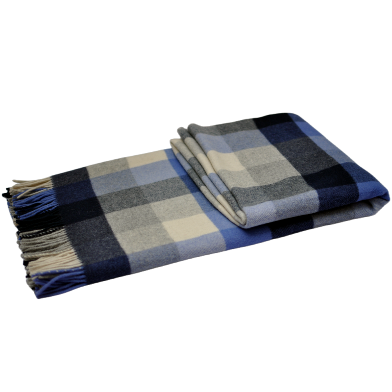 Detailed close-up of the artisan fringe borders and structured plaid weave alignment on K1003 wool throw