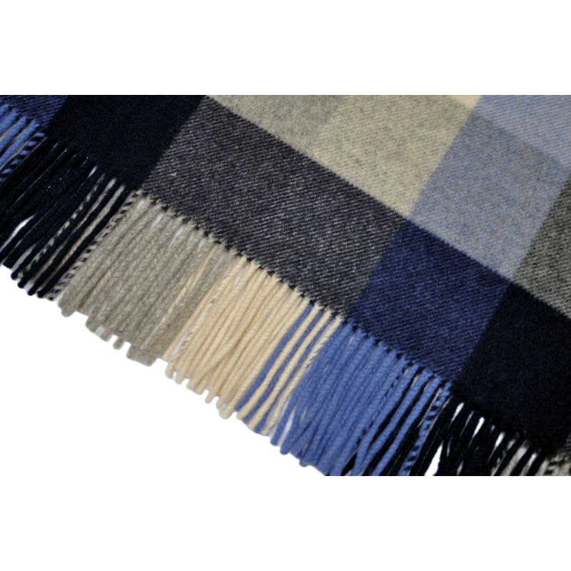 Close-up view of folded K1003 100 percent pure wool blanket highlighting its soft touch 21 micron fiber texture