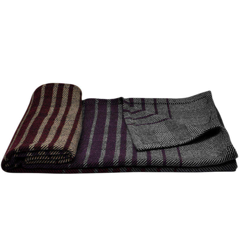 Premium-blue-phoenix-wool-throw-folded-showing-brand-label-gradient-weave