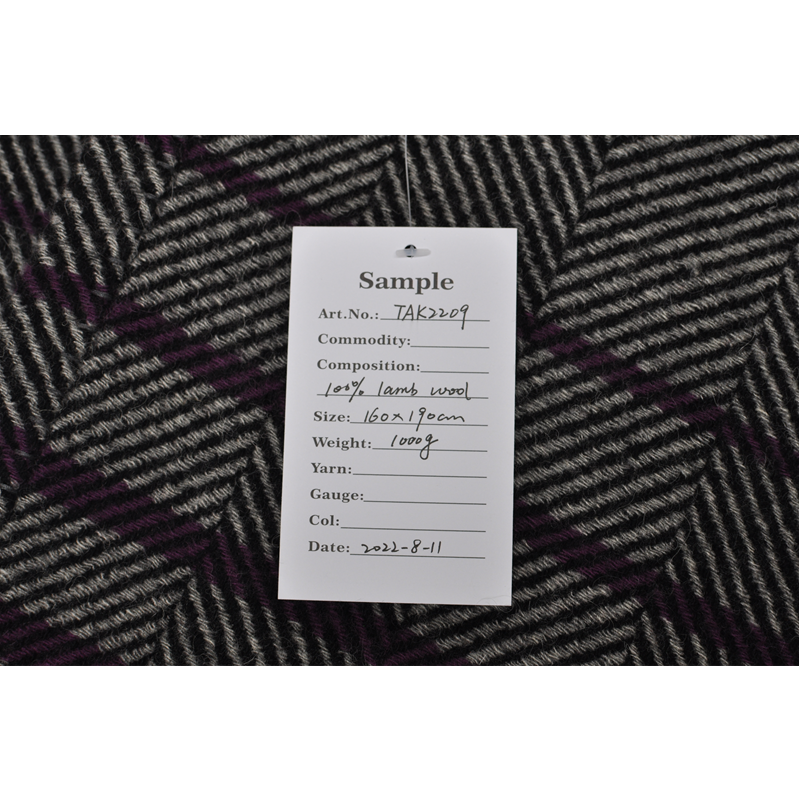 Detailed-fiber-texture-of-high-end-reversible-herringbone-wool-blanket