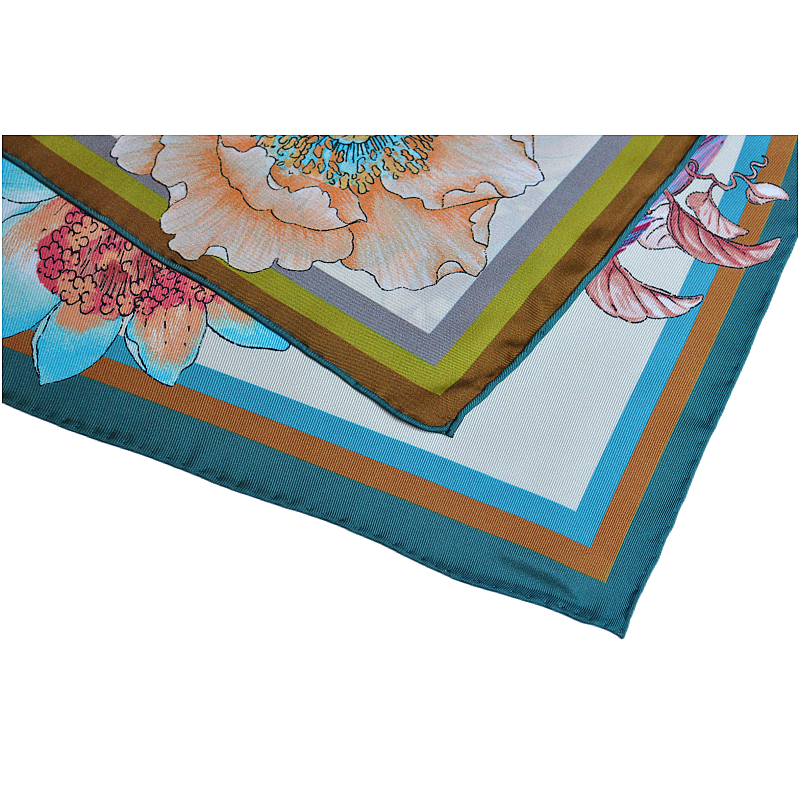 close-up-of-hand-finished-edges-on-blue-phoenix-silk-twill-scarf