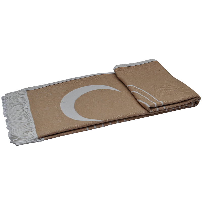 Close-up of neatly folded TDX2135 luxury organic cotton throw with fringed edges,