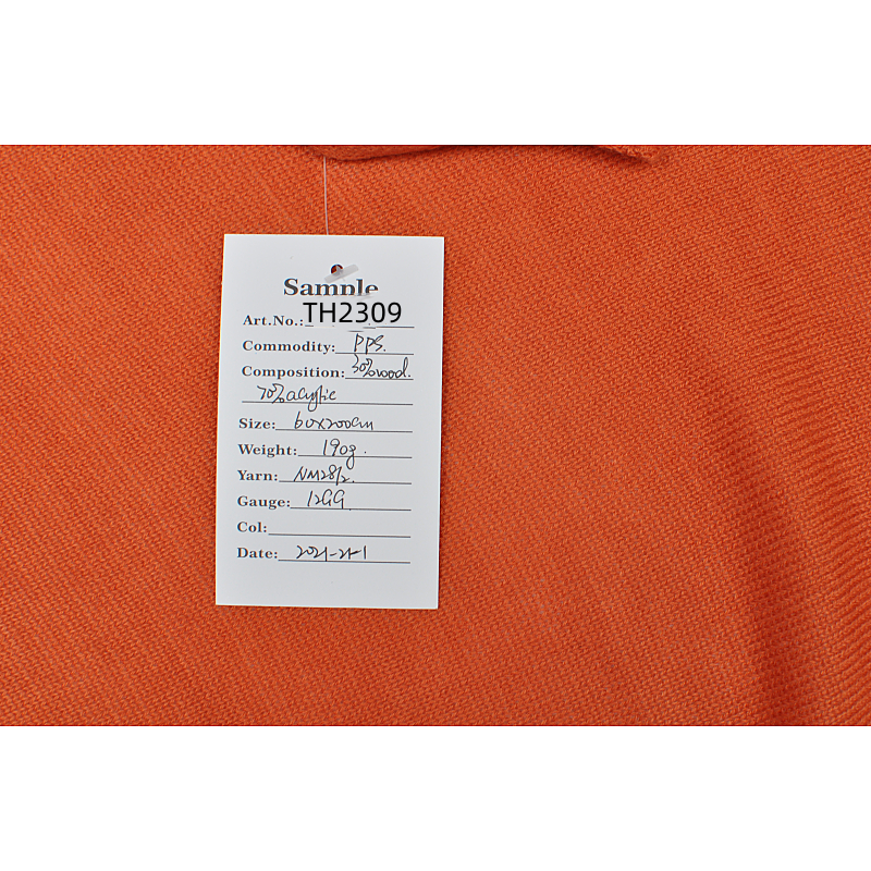 Close-up of TH2309 product tag showing 30 percent wool 70 percent acrylic composition and 190g weight