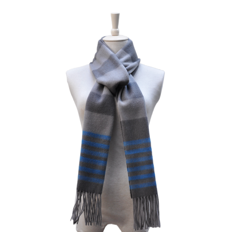 Model wearing the unisex WAZ1902-A 100% Merino wool long scarf, grey and blue horizontal stripes