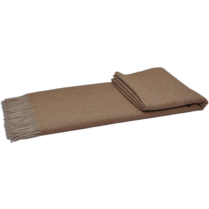 Detailed-view-of-hand-twisted-fringes-on-luxury-camel-hair-throw