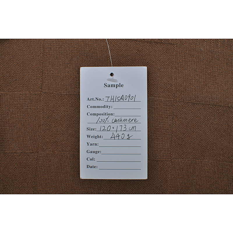 TH15A0901 cashmere blanket sample tag, showing 100% cashmere composition, size 120x173cm and weight 440g