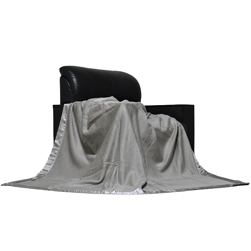 teh2301 mulberry silk cotton blanket draped over chair showing soft grey surface elegant drape and satin binding