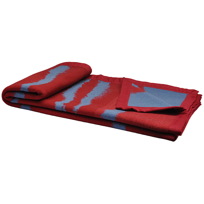 Folded red and grey wave-pattern wool throw blanket.
