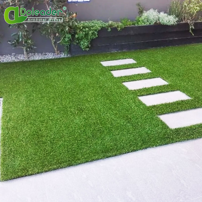 How to install artificial grass between pavers?