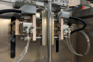 construction of triangle sachet packing machine