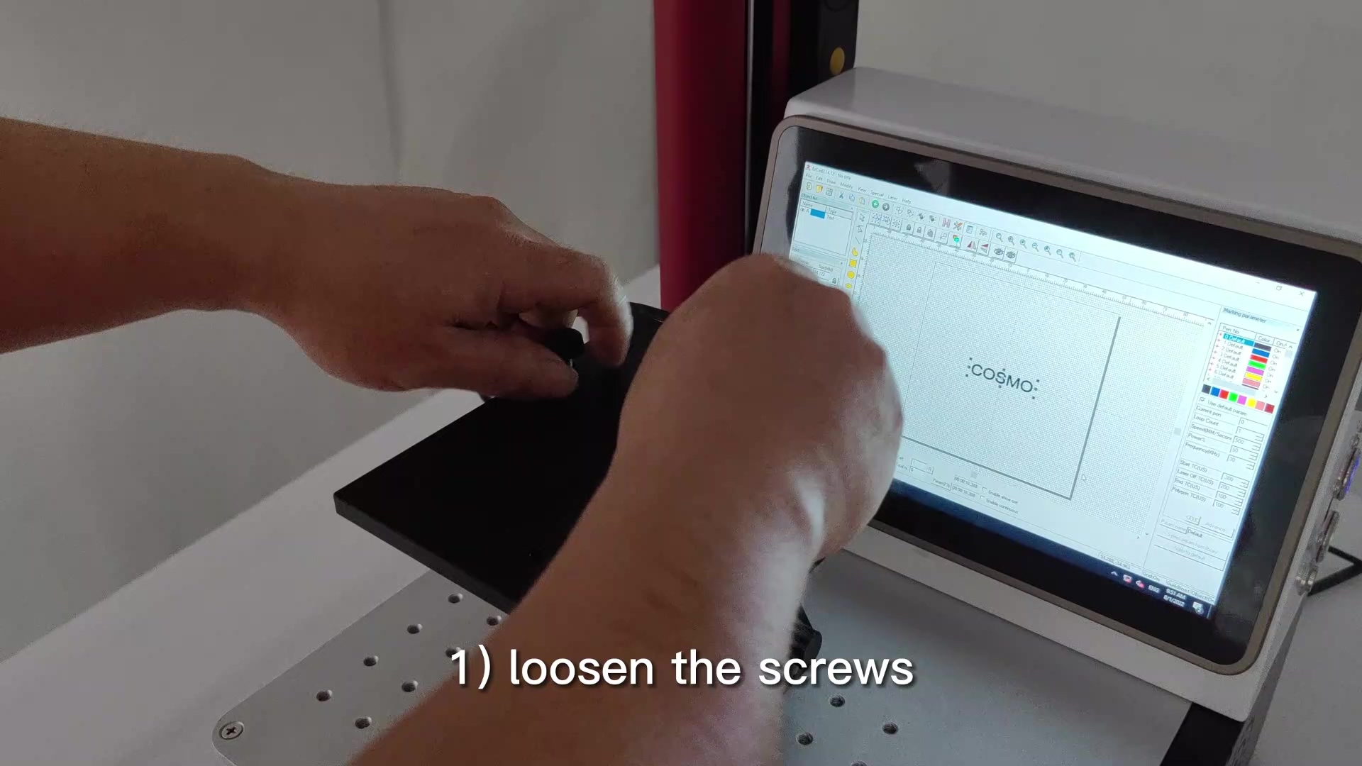 loosen the screws that link the flat workbench and rotary marking device