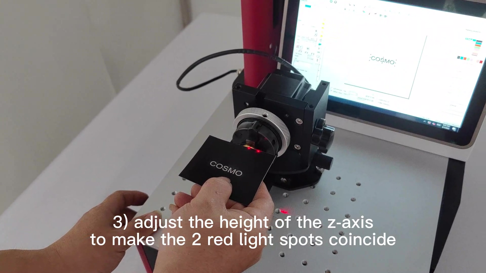 adjust the height of the z-axis to make the 2 red light spots coincide
