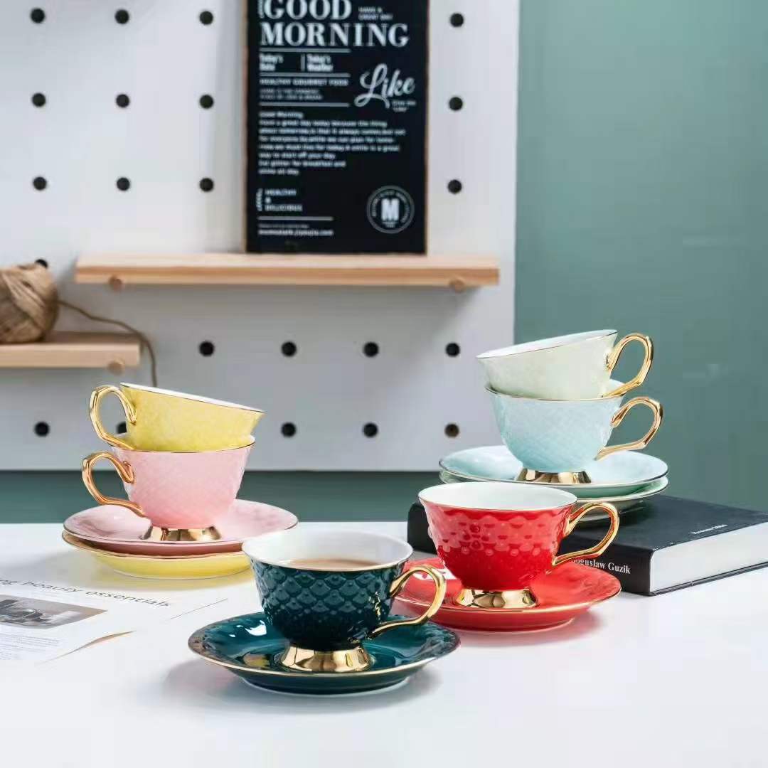 European relief ceramic coffee cup and dish set with tray and spoon