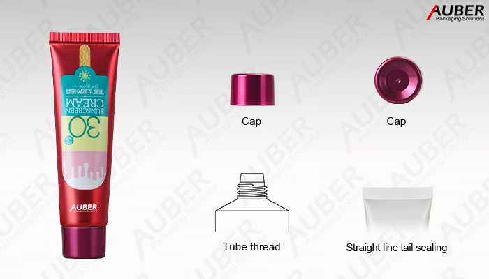 マットローズレッドのメタライズドキャップ付き日焼け止めパッケージの